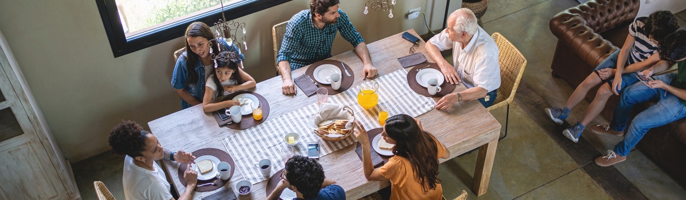 Family gathered around table