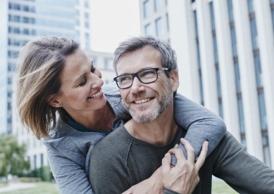 Happy Couple Hugging Outside